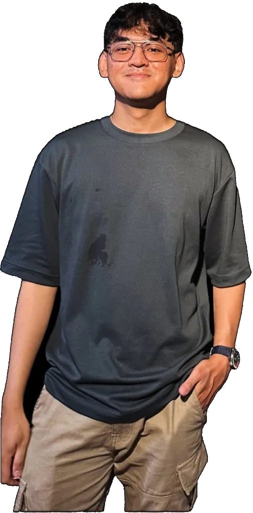 Axel Andrian wearing glasses and a charcoal T-shirt