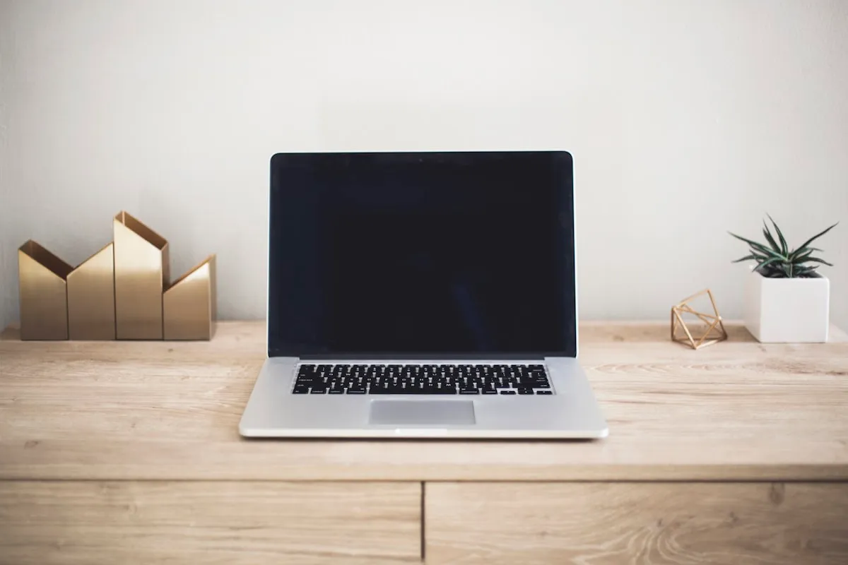 Laptop on a desk, illustrative project image